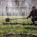 Öntözés a kézzel megszórva - videó Öntözés a kézzel megszórva - videó